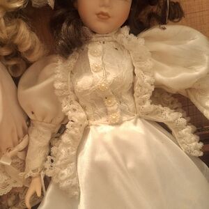 Elegant White Porcelain Doll